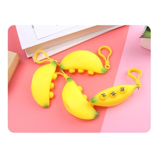 Móc khoá squishy quả chuối bóp ra mặt cười độc lạ
