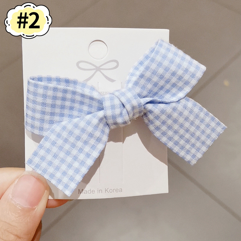 Kẹp tóc đính nơ họa tiết nhiều màu phối kim loại an toàn dành cho bé