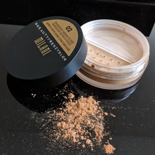 Phấn phủ Milani kềm dầu Setting Powder 3,5g