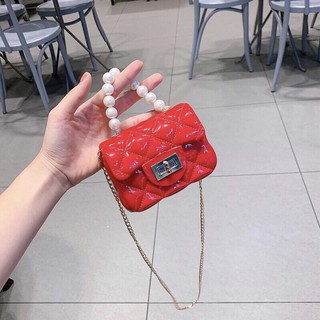 Túi xách mini quai ngọc cho bé