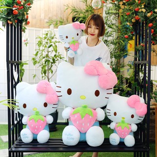 GẤU BÔNG KITTY ÔM DÂU SIZE 30CM