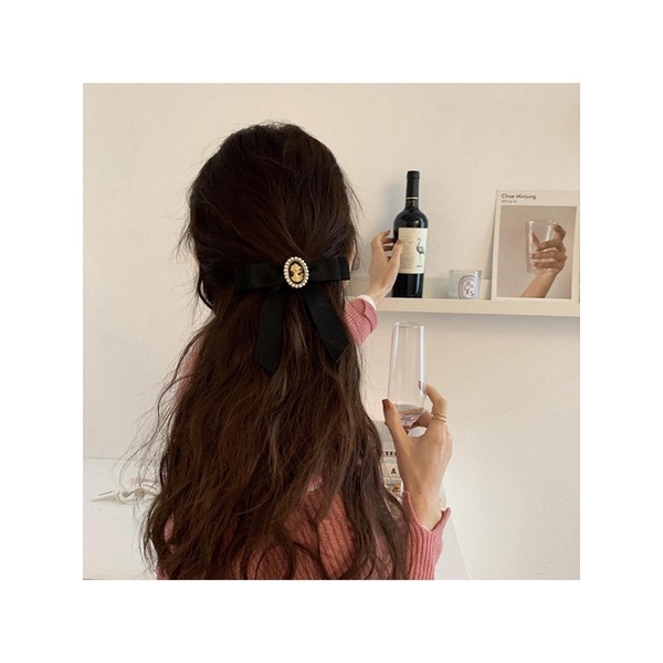 Kẹp tóc hình nơ phong cách dễ thương dành cho nữ