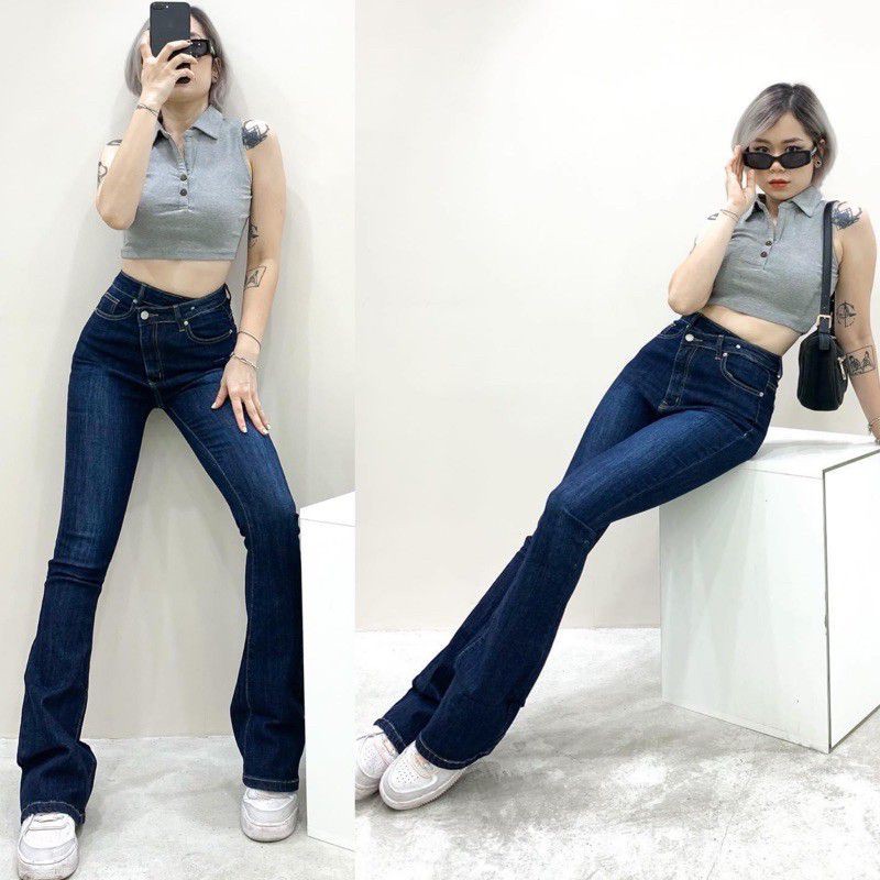 Quần jeans loe cúc lệch dáng dài