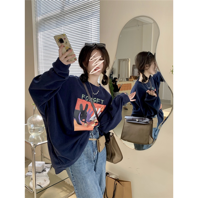 Áo thun tay dài cổ tròn dáng rộng in họa tiết thời trang mùa thu phong cách Hàn Quốc cho nữ 2 màu tùy chọn | BigBuy360 - bigbuy360.vn