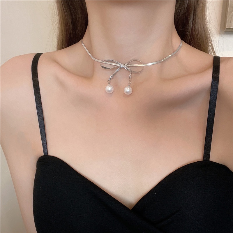 vòng cổ choker chuỗi ngọc đính nơ sang trọng quý phái
