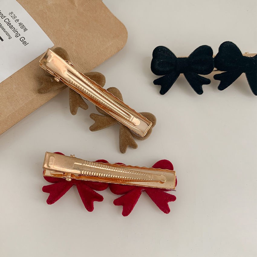 Kẹp tóc hình nơ xinh xắn cho nữ