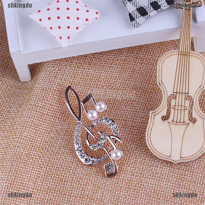 Cài áo hình nốt nhạc đính đá và ngọc trai thanh lịch