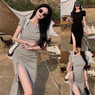 Váy thun body xẻ đùi rút dây dáng dài. Đầm ôm body