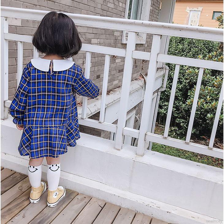 Đầm dài tay kẻ ca rô cho bé