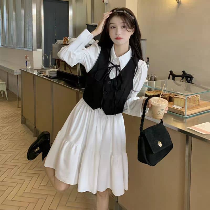Set áo gile ngắn đen cổ V nữ sinh thắt nơ + váy sơmi trắng dài tay tầng bèo dáng babydoll xinh xắn có size