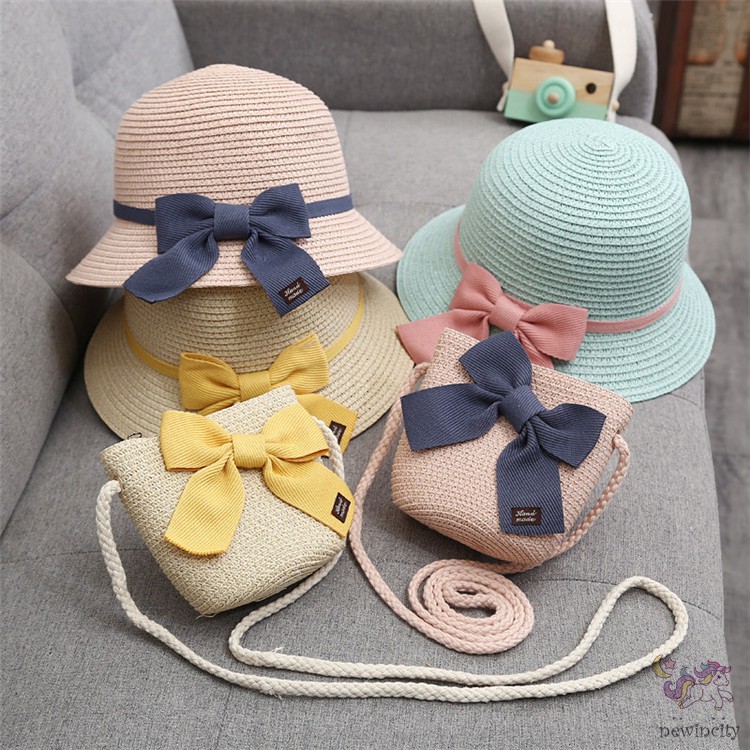 Set mũ vành và túi xách đan cói đính nơ thời trang mùa hè đáng yêu cho bé gái