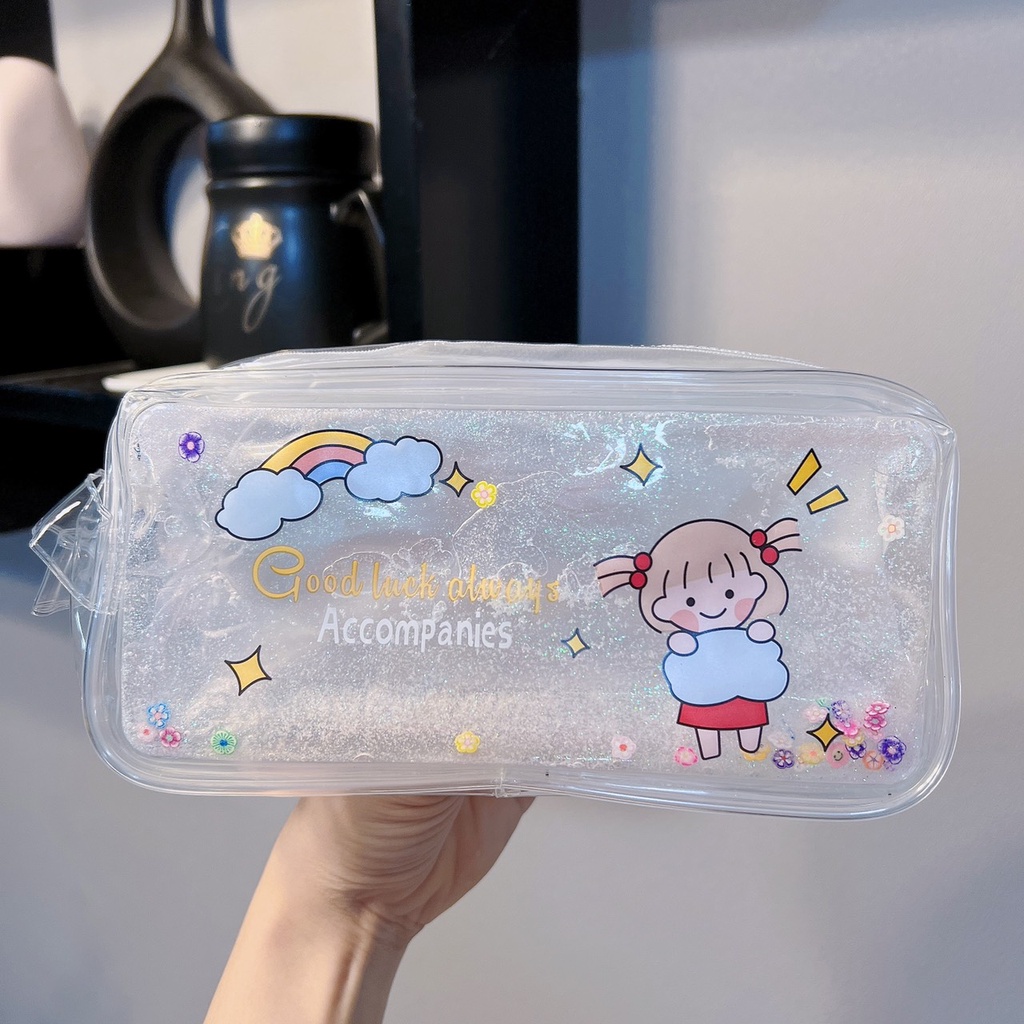 Hộp Bút Trong Suốt Hoạ Tiết Hạt Cát, Kim Tuyến Lấp Lánh Chuyển Động 19.5 x 9.5cm - Giao Ngẫu Nhiên