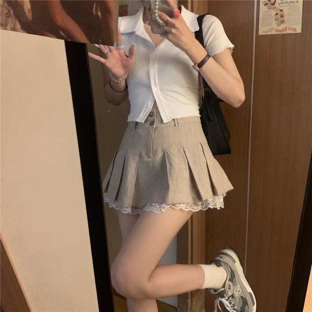 Ready Stock Korean hot girl polo collar cardigan short-sleeved T-shirt + two-piece design cotton and linen lace stitching pleated skirt