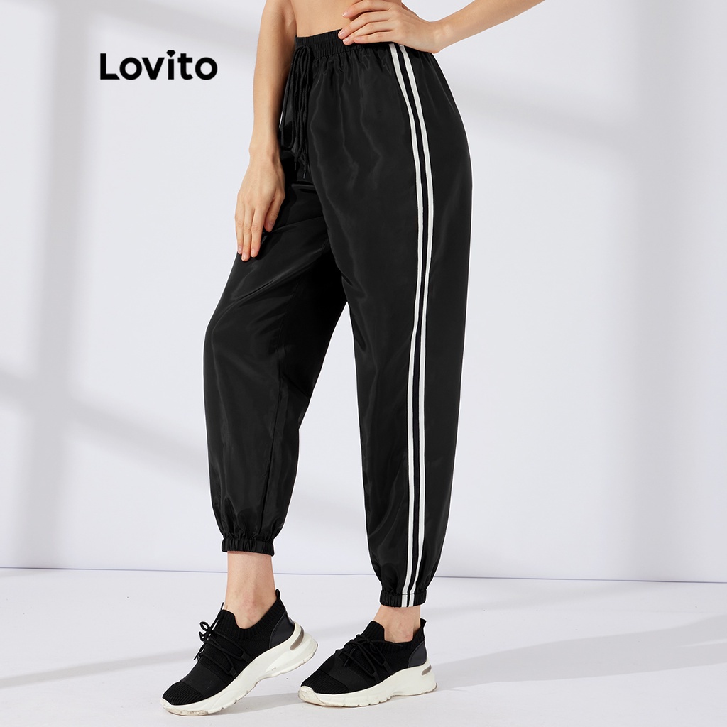 Quần thể thao Lovito chất liệu nylon với dây rộng cột phía trước phối viền tương phản L23AD051 (màu đen)