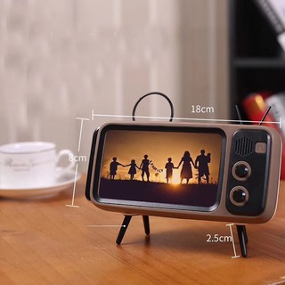 Loa Bluetooth mini kiêm giá đỡ điện thoại