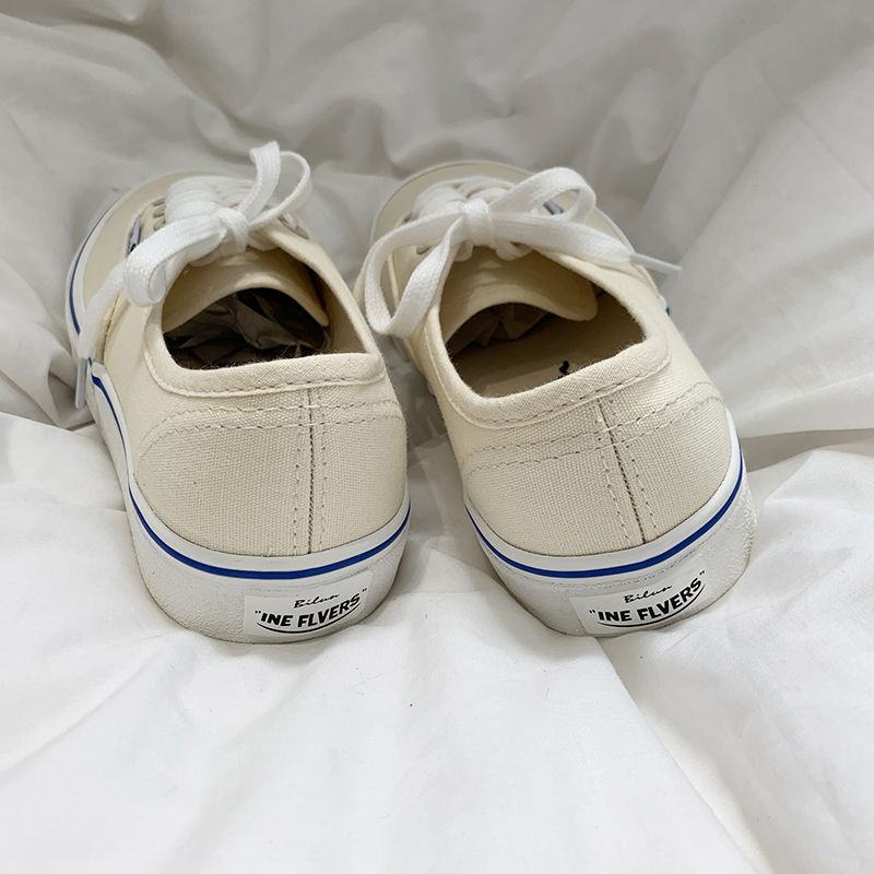 Giày ulzzang đế bằng màu sữa viền xanh