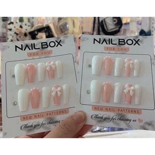 Nail box trắng hồng nơ đá