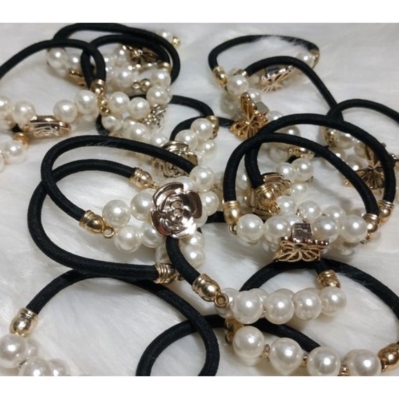 Dây buộc tóc đính hạt ngọc T.r.a.i