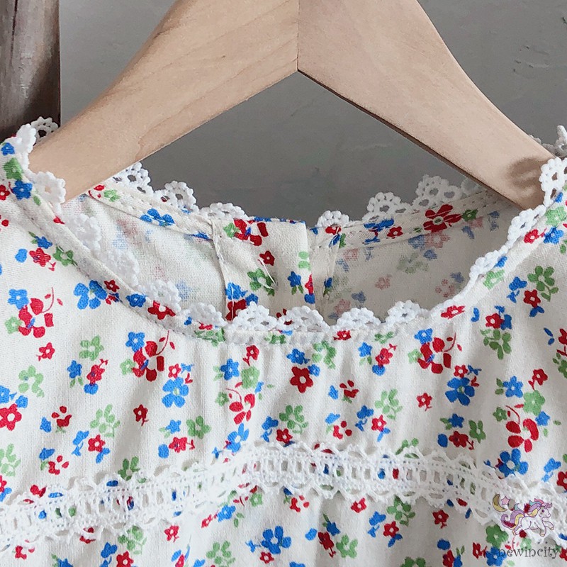 Đầm Xòe Tay Phồng In Hoa Cho Bé