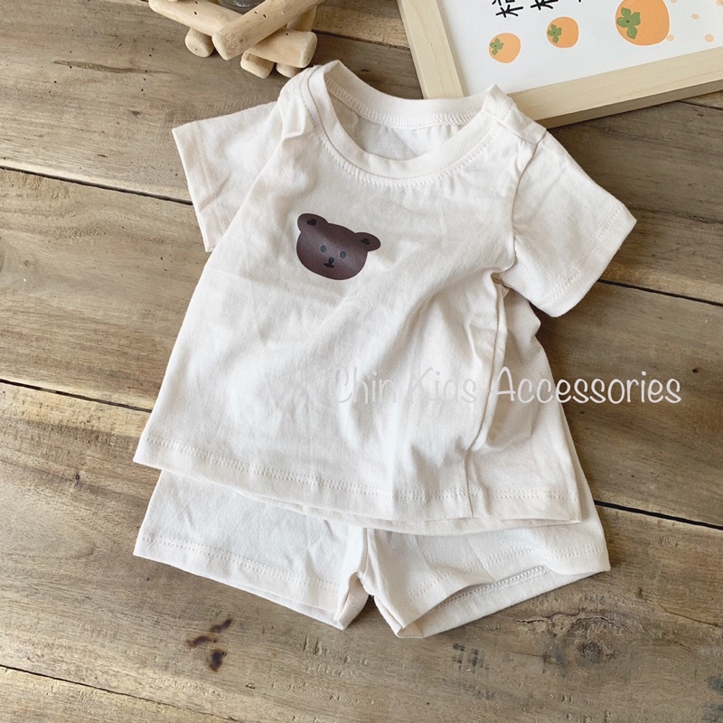 Bộ quần áo unisex trắng kem hình gấu vải cotton Hàn 2 chiều mỏng mát