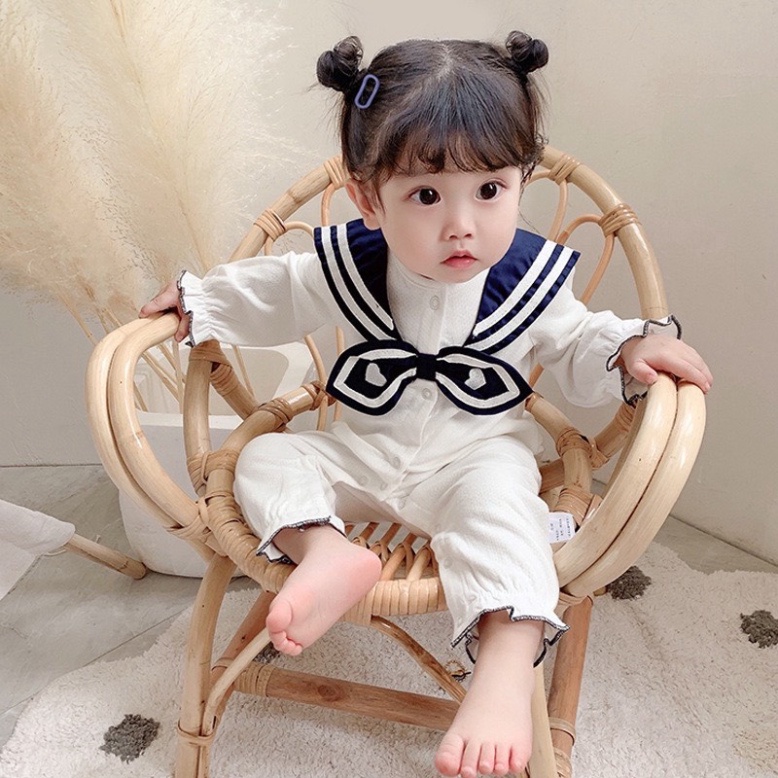 Body dài tay cổ nơ màu than bé gái