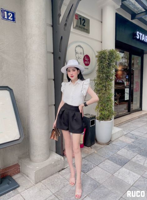 Sơ mi trắng cánh tiên chạy viền đen