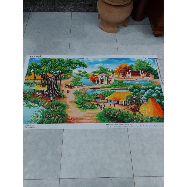 Tranh gắn đá đồng quê gắn 90% ,tranh đính đá chưa đính.