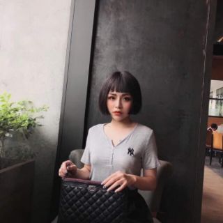 Áo phông cúc cài cổ túi zip