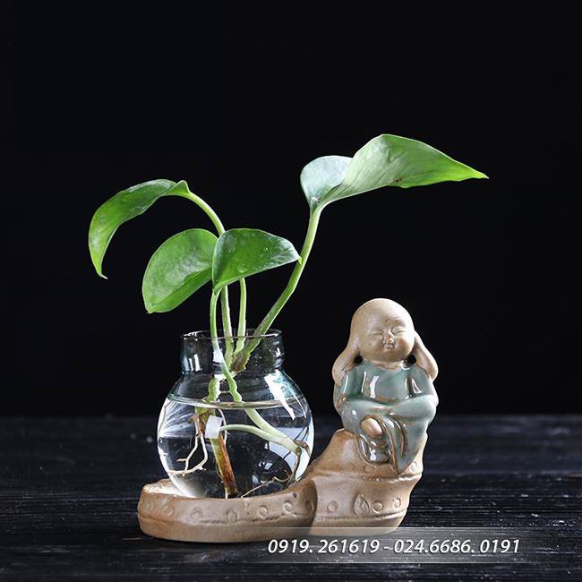 Tượng 4 không an lạc kèm bình hoa