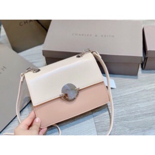 Túi CNK Hồng khoá tròn