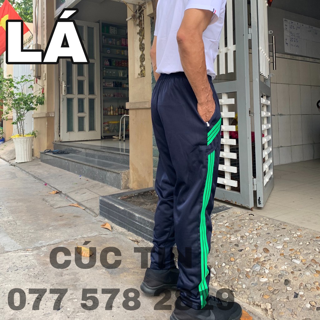 QUẦN THỂ THAO DÀI, 3 SỌC, CÓ 2 TÚI KHÓA KÉO. CÚC TIN