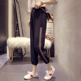 Quần thể thao đen phối lưới