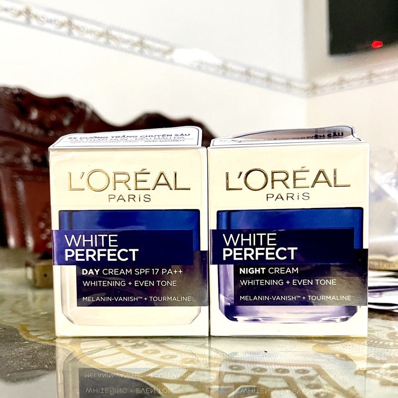 Bộ dưỡng da trắng mượt đều màu kem ngày và kem đêm Loreal - L'Oréal Paris Aura Perfect 50ml x 2