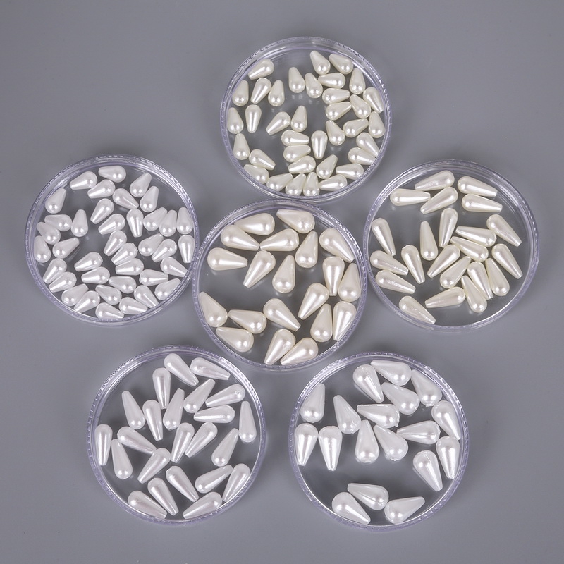 Hạt ngọc trai giả ABS hình bầu dục màu trắng ngà để làm trang sức