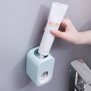 Handy wall mounted automatic toothpaste dispenser