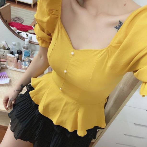 Áo nhún v khuy tay bồng bo chun hot hit