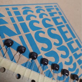 A03 Tụ điện màu đen AHSV 100V 103 0.01UF 10NF NISSEI/NIS (01 con)