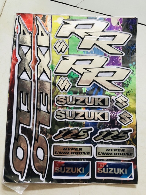 Tem logo Axelo suzuki nổi crom nguyên bộ