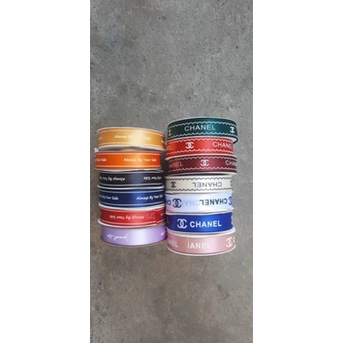 1 cuộn ruybang chữ 2,5cm chữ, mẫu ngẫu nhiên