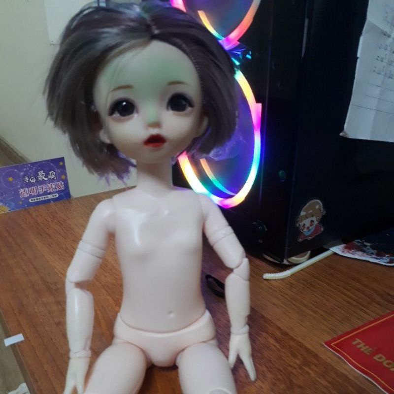 búp bê bjd 28cm (được tặng kèm quần áo, balo bằng giấy nhưng rất đẹp, tặng kèm vở) có kèm theo giày.