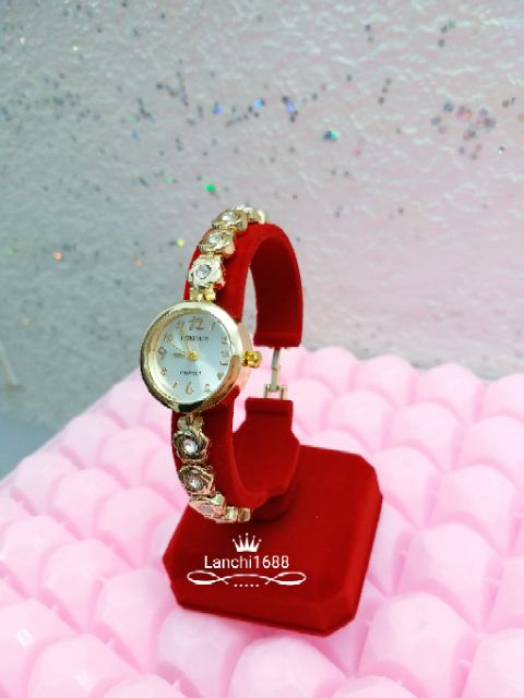 Đồng hồ lắc tay nữ hoa hồng HR4289