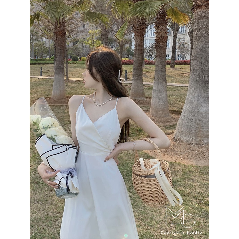 Đầm/ Váy hai dây màu trắng hở lưng phù hợp đi biển hoặc đi tiệc [MinC.Studio - MCV005]