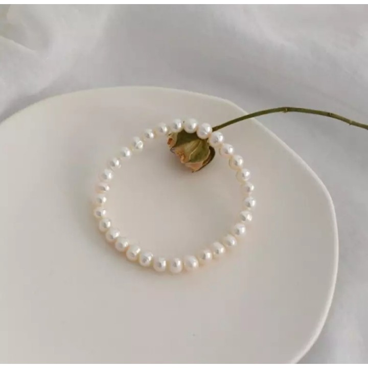 Lắc tay trai thật tự nhiên 6li màu trắng