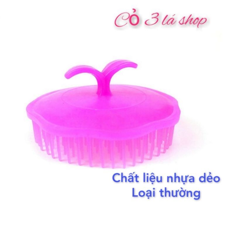 Lược gội đầu massage nhựa dẻo loại thường.