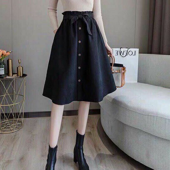 Chân váy chữ A kèm dây thắt nơ dài tới gối sang chảnh.