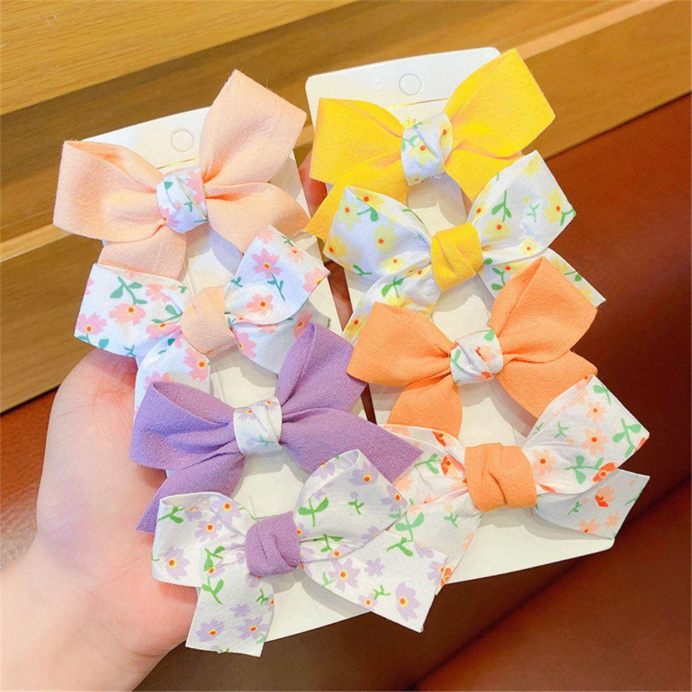 Bộ 2 Kẹp Tóc Nơ Họa Tiết Hoa Xinh Xắn Cho Bé Gái