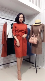 Váy len nơ QC màu cam đất.