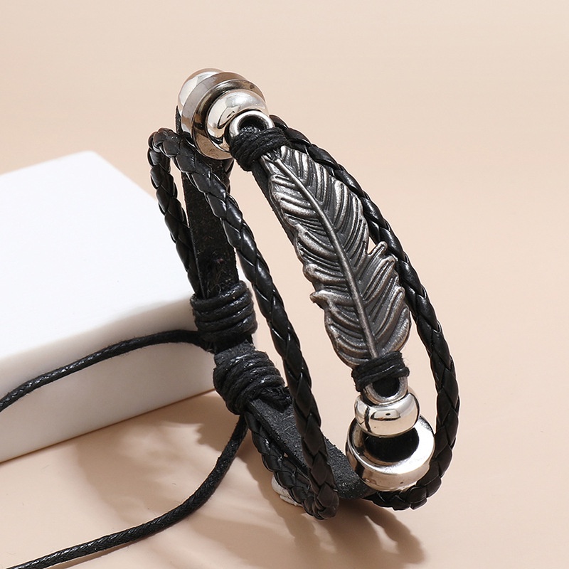 Vòng Đeo Tay Da Handmade Cánh Thiên Thần Unisex Nhiều Sợi