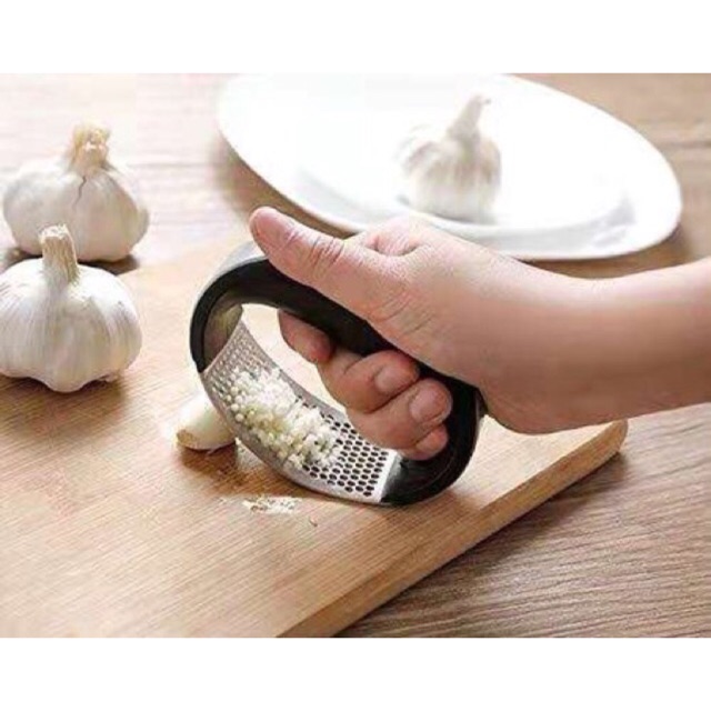 Dụng cụ ép tỏi cầm tay