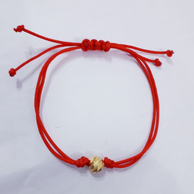 Chỉ đỏ may mắn bi vàng